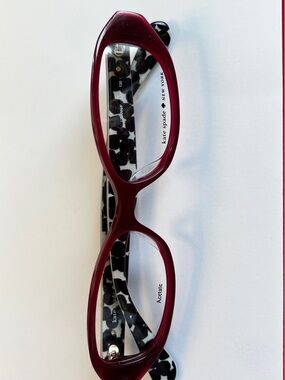 kate spade burgundy front with black-and-white patterned temples eyeglasses